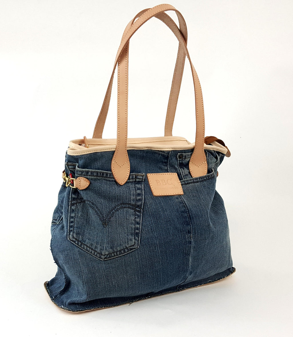 Cosmo Hook Sides Limited Edition. One of a kind Vintage Levi's and Mudcloth. Genuine Leather Tote Bag