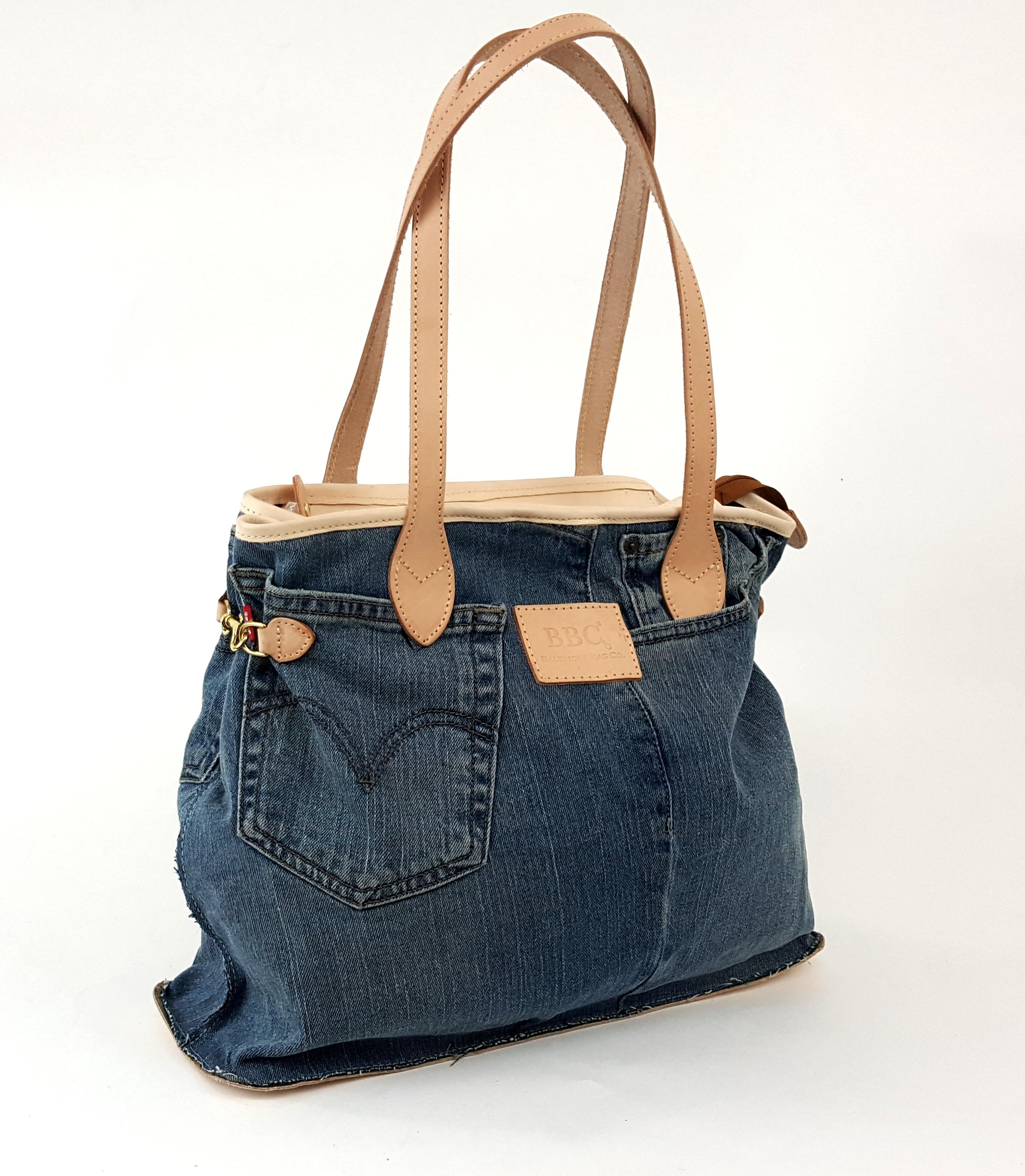 Cosmo Hook Sides Limited Edition. One of a kind Vintage Levi's and Mudcloth. Genuine Leather Tote Bag