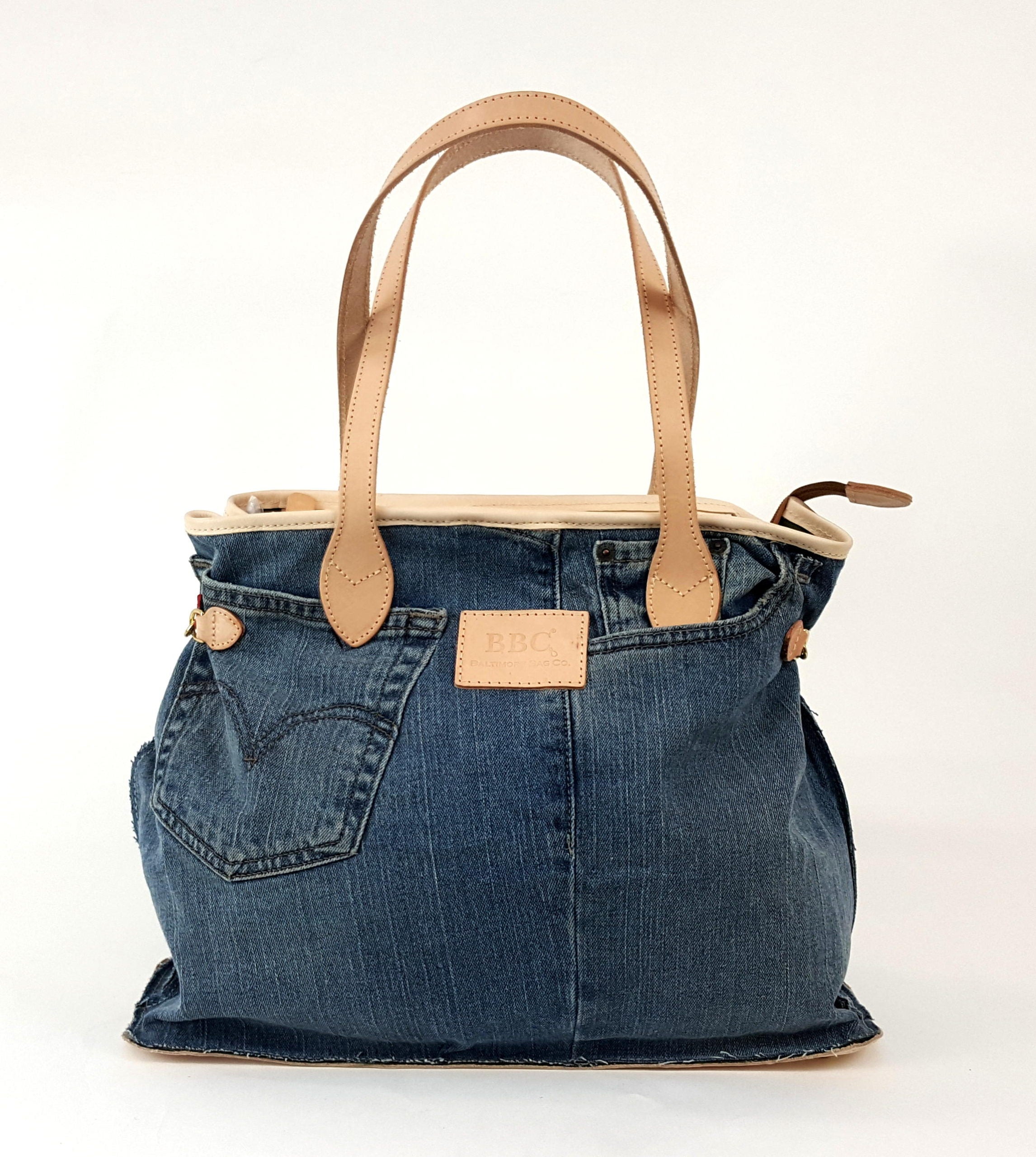 Cosmo Hook Sides Limited Edition. One of a kind Vintage Levi's and Mudcloth. Genuine Leather Tote Bag